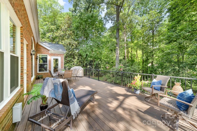 122 Waterford Dr, Mooresville, NC 28117 - wooden deck with outdoor dining space and grilling area