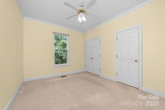 122 Waterford Dr, Mooresville, NC 28117 - unfurnished bedroom with crown molding, baseboards, and light carpet