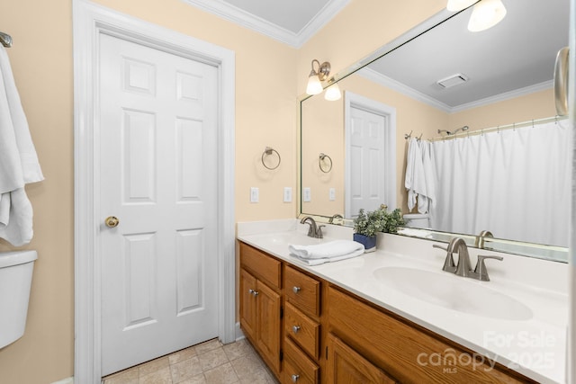 122 Waterford Dr, Mooresville, NC 28117 - full bathroom featuring double vanity, crown molding, and toilet