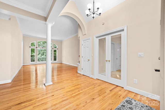 122 Waterford Dr, Mooresville, NC 28117 - spare room featuring french doors, wood finished floors, ornamental molding, a chandelier, and baseboards