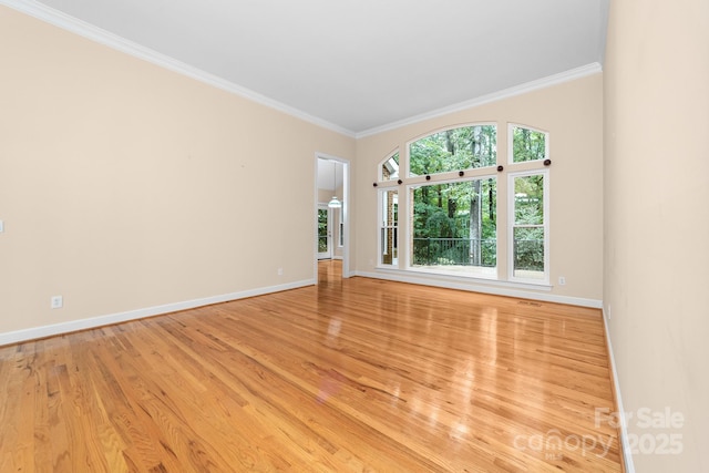 122 Waterford Dr, Mooresville, NC 28117 - unfurnished room featuring baseboards, crown molding, and light wood-style floors