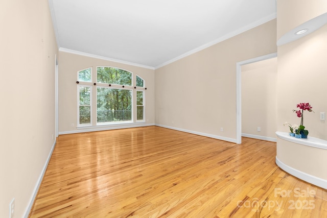 122 Waterford Dr, Mooresville, NC 28117 - spare room with crown molding, light wood-style flooring, and baseboards