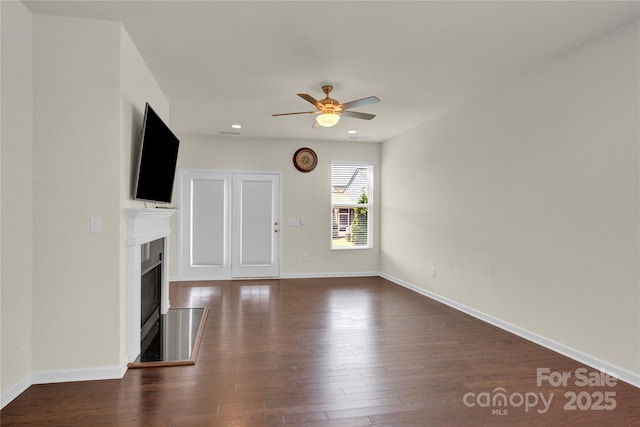 4243 Merrivale Dr, Lancaster, SC 29720 - unfurnished living room featuring a fireplace, ceiling fan, wood finished floors, baseboards, and recessed lighting