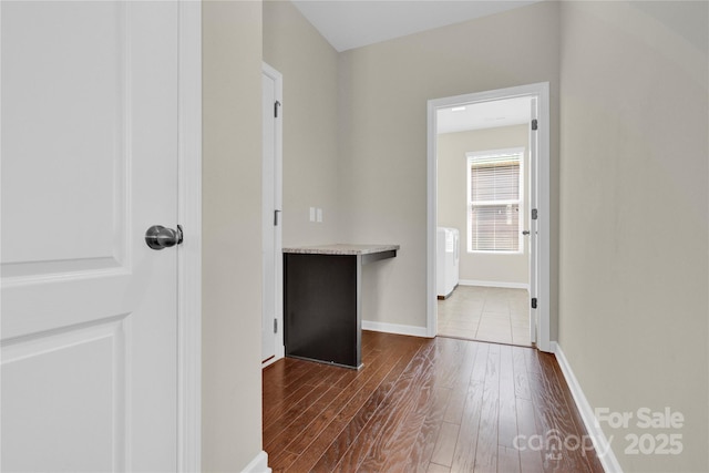 4243 Merrivale Dr, Lancaster, SC 29720 - corridor featuring dark wood-type flooring and baseboards