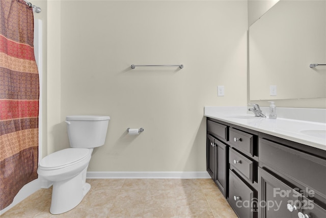 4243 Merrivale Dr, Lancaster, SC 29720 - full bathroom with toilet, double vanity, tile patterned floors, baseboards, and a shower with shower curtain