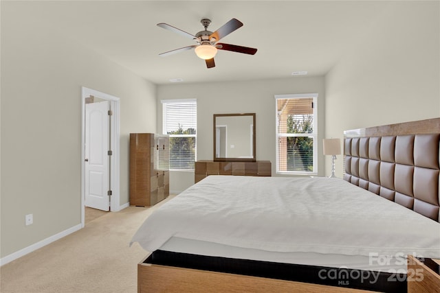 4243 Merrivale Dr, Lancaster, SC 29720 - bedroom featuring light colored carpet, multiple windows, baseboards, and a ceiling fan