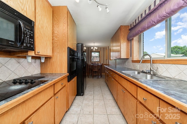 3685 Curleys Fish Camp Rd, Connelly Springs, NC 28612 - kitchen featuring black appliances, a sink, decorative backsplash, and dark countertops