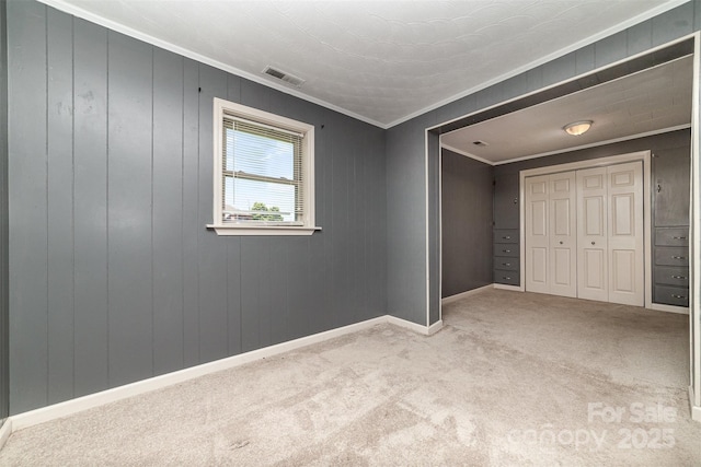 3685 Curleys Fish Camp Rd, Connelly Springs, NC 28612 - unfurnished bedroom featuring crown molding, carpet, baseboards, and a closet