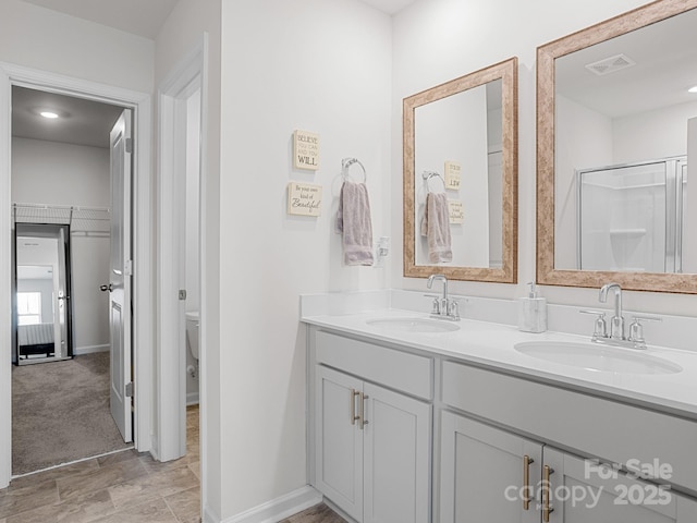 7007 Manse Ct, Boiling Springs, SC 29316 - bathroom featuring double vanity and an enclosed shower