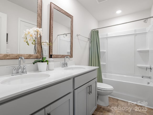 7007 Manse Ct, Boiling Springs, SC 29316 - full bathroom featuring shower / bath combo, double vanity, recessed lighting, and stone finish floors