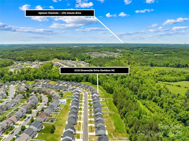 3110 Streamside Dr, Davidson, NC 28036 - aerial view of residential area with a heavily wooded area