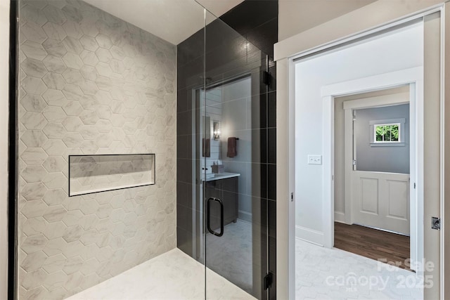 2829 Holt St, Charlotte, NC 28205 - full bath with a shower stall and wood finished floors