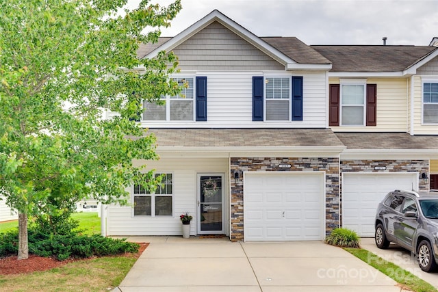 2169 Shady Pond Dr, Clover, SC 29710 - multi unit property with an attached garage, concrete driveway, stone siding, and a shingled roof