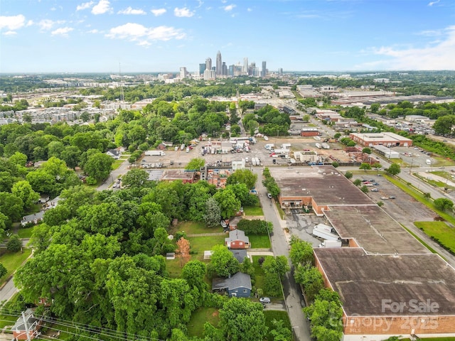 2536 Bancroft St, Charlotte, NC 28206 - aerial view of property's location featuring a view of skyline and a tree filled landscape