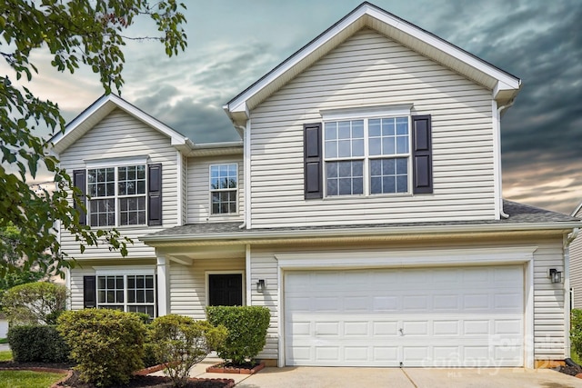6332 Sackett Way, Charlotte, NC 28269 - traditional-style house with an attached garage and concrete driveway