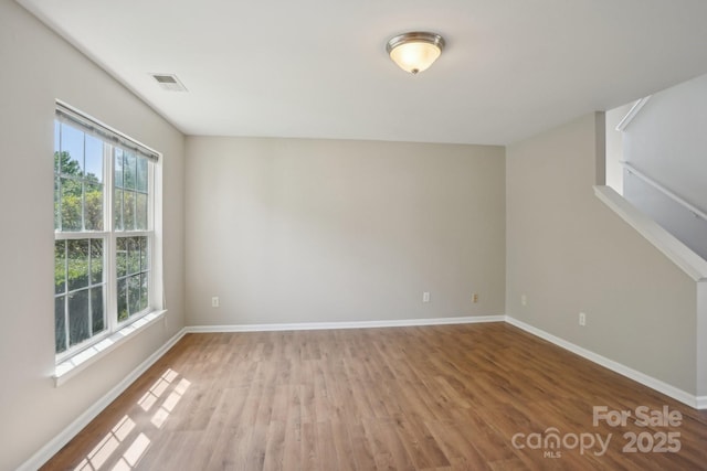 6332 Sackett Way, Charlotte, NC 28269 - empty room with wood finished floors and baseboards