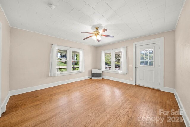 35 Amethyst St, Spruce Pine, NC 28777 - entryway with light wood-style floors, a ceiling fan, baseboards, and ornamental molding