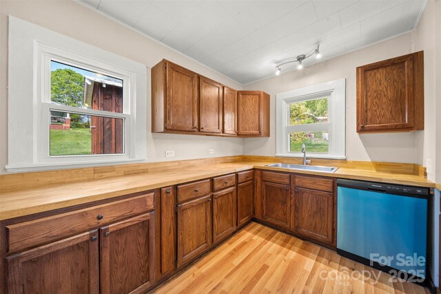 35 Amethyst St, Spruce Pine, NC 28777 - kitchen with wood counters, dishwasher, a sink, light wood-type flooring, and brown cabinetry