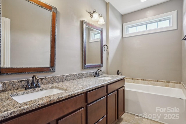 2021 Chantilly Ln, Salisbury, NC 28146 - bathroom with a garden tub, double vanity, and tile patterned flooring