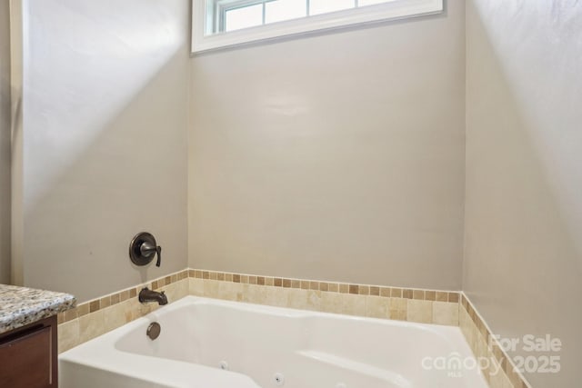 2021 Chantilly Ln, Salisbury, NC 28146 - bathroom featuring a tub with jets and vanity