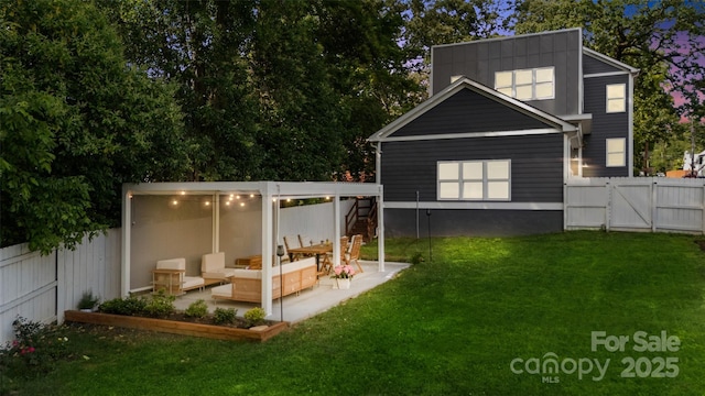 1446 Downs Ave, Charlotte, NC 28205 - back of property with a fenced backyard, a gate, and a patio