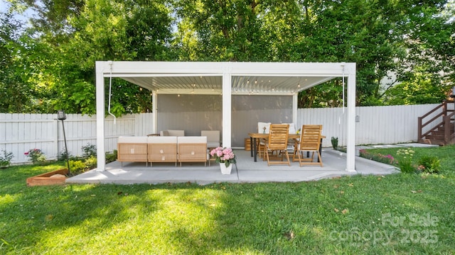 1446 Downs Ave, Charlotte, NC 28205 - fenced backyard with a patio and an outdoor hangout area