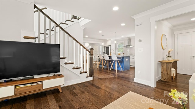 1446 Downs Ave, Charlotte, NC 28205 - entrance foyer featuring ornamental molding, dark wood-type flooring, stairway, and recessed lighting