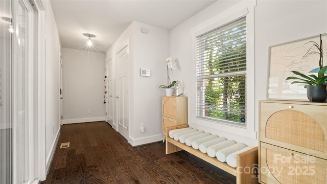 1446 Downs Ave, Charlotte, NC 28205 - foyer entrance with wood finished floors and baseboards