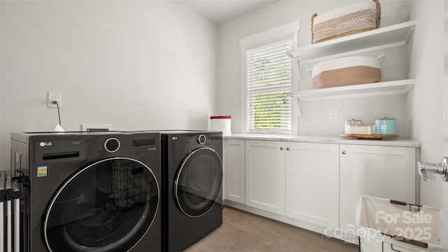 1446 Downs Ave, Charlotte, NC 28205 - laundry room with separate washer and dryer, cabinet space, and light tile patterned flooring