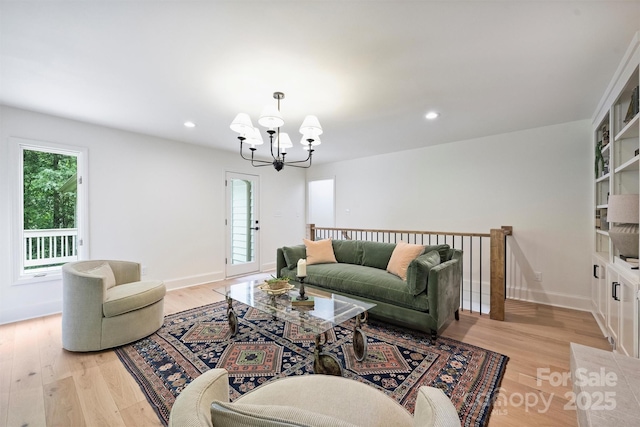 9520 Squirrel Hollow Ln, Charlotte, NC 28270 - living area featuring a chandelier, light wood-type flooring, recessed lighting, and baseboards