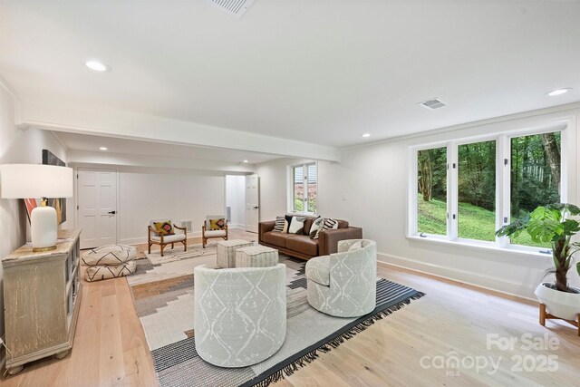 9520 Squirrel Hollow Ln, Charlotte, NC 28270 - living area with light wood-type flooring, baseboards, and recessed lighting