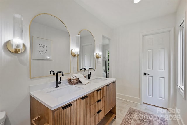 9520 Squirrel Hollow Ln, Charlotte, NC 28270 - full bathroom featuring double vanity and baseboards