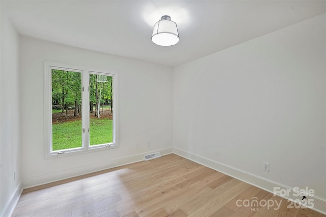 9520 Squirrel Hollow Ln, Charlotte, NC 28270 - spare room featuring light wood-style floors and baseboards