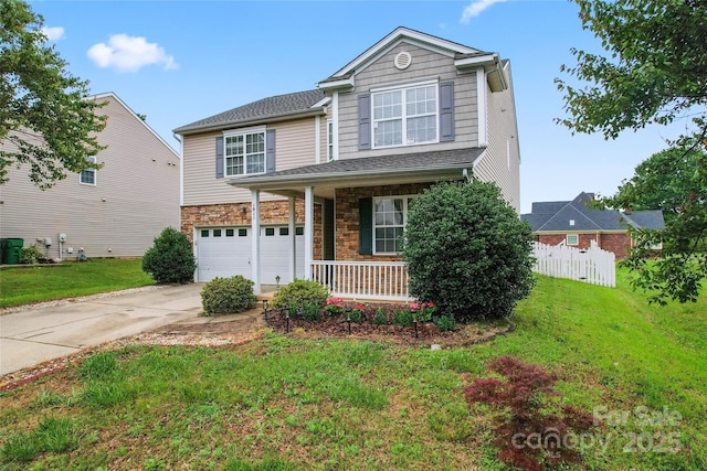 1911 Savannah Hills Dr, Matthews, NC 28105 - traditional home with a garage, covered porch, driveway, and stone siding