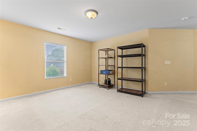 1911 Savannah Hills Dr, Matthews, NC 28105 - carpeted empty room with a smoke detector and baseboards