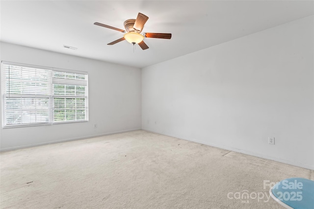 1911 Savannah Hills Dr, Matthews, NC 28105 - carpeted spare room featuring ceiling fan and baseboards