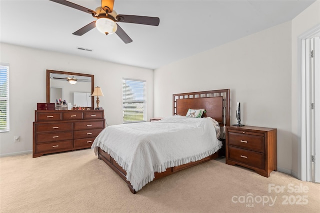 1911 Savannah Hills Dr, Matthews, NC 28105 - bedroom featuring light carpet, ceiling fan, and baseboards