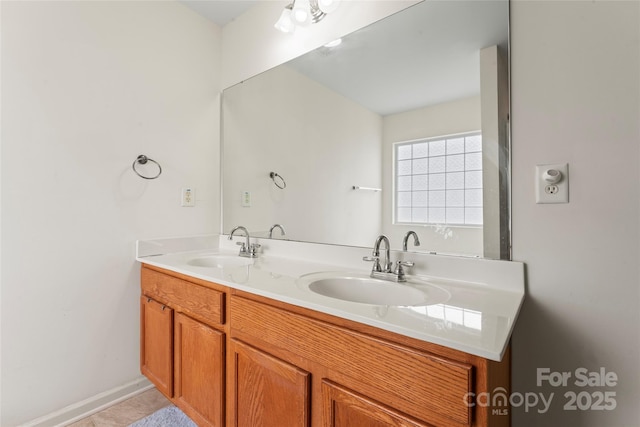 1911 Savannah Hills Dr, Matthews, NC 28105 - bathroom with double vanity and baseboards