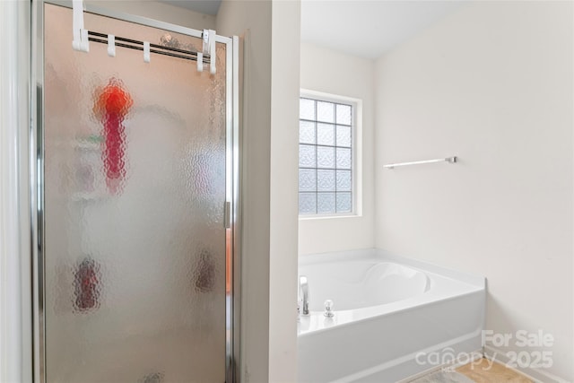 1911 Savannah Hills Dr, Matthews, NC 28105 - full bath featuring a stall shower, a bath, and baseboards