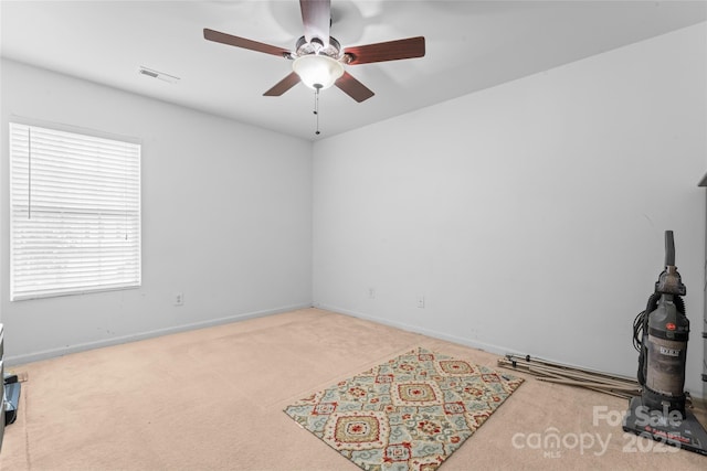 1911 Savannah Hills Dr, Matthews, NC 28105 - spare room with carpet flooring, ceiling fan, and baseboards