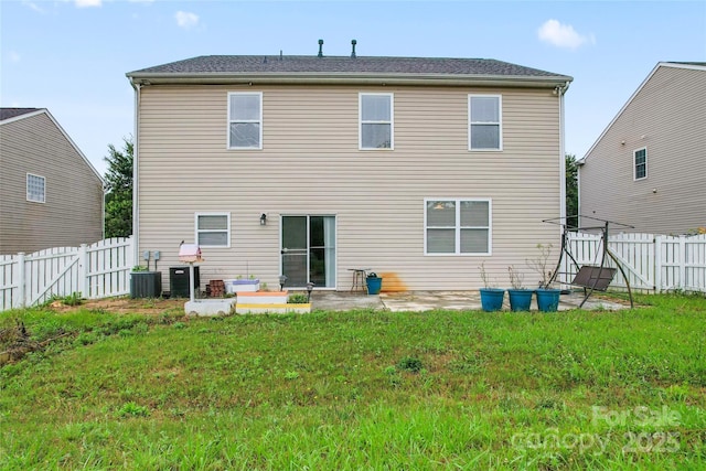 1911 Savannah Hills Dr, Matthews, NC 28105 - back of property with a patio area, central AC, and a gate