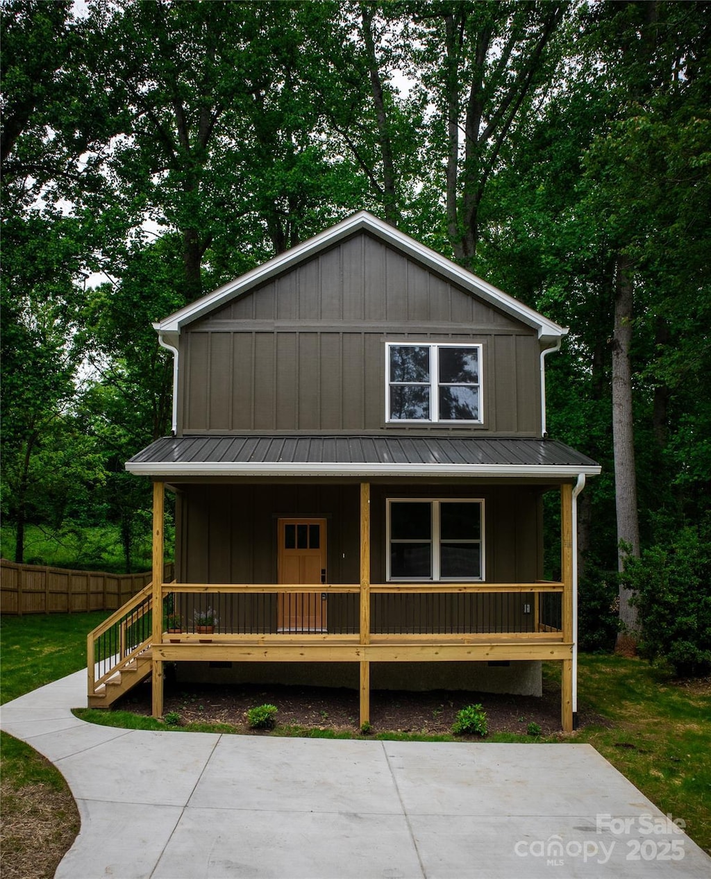 13 Pinecrest Dr, Asheville, NC 28803 - view of front of home with a porch, board and batten siding, and metal roof