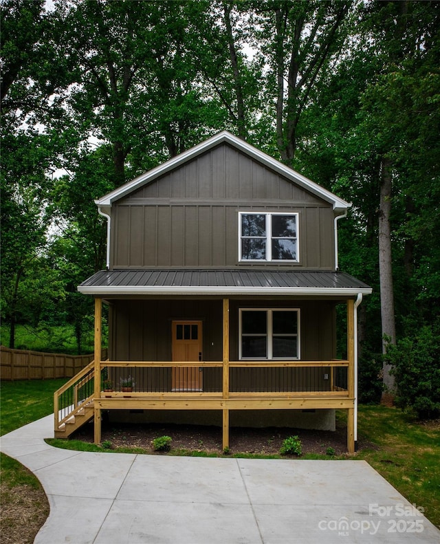 13 Pinecrest Dr, Asheville, NC 28803 - view of front of home with a porch, board and batten siding, and metal roof