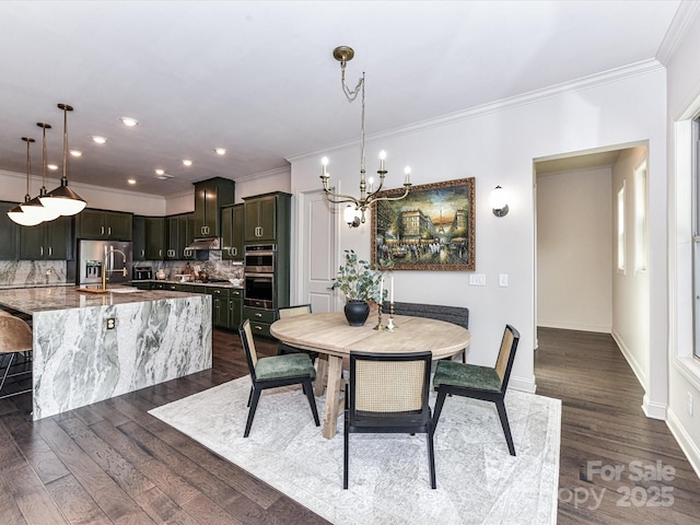 121 Enclave Meadows Ln, Matthews, NC 28104 - dining area with ornamental molding, dark wood finished floors, a chandelier, baseboards, and recessed lighting