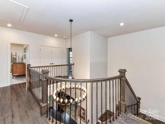 121 Enclave Meadows Ln, Matthews, NC 28104 - hall featuring an upstairs landing, attic access, wood-type flooring, baseboards, and recessed lighting