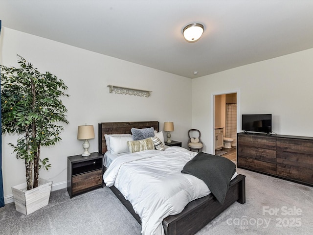 121 Enclave Meadows Ln, Matthews, NC 28104 - carpeted bedroom with connected bathroom and baseboards