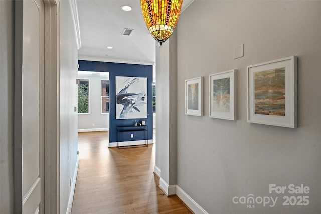 229 N Church St Unit 204, Charlotte, NC 28202 - hall with ornamental molding, wood finished floors, baseboards, and recessed lighting