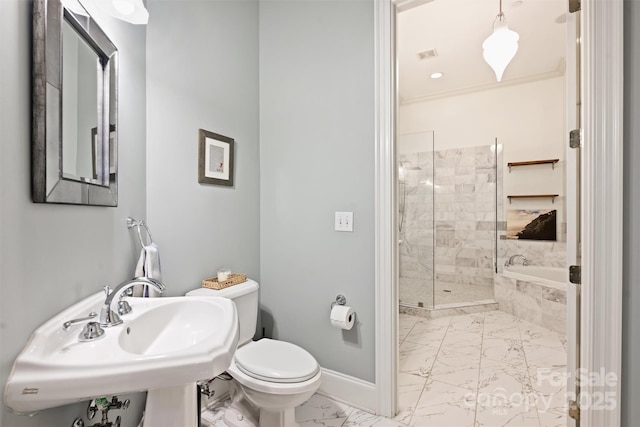 229 N Church St Unit 204, Charlotte, NC 28202 - bathroom with marble finish flooring, a stall shower, toilet, baseboards, and a garden tub