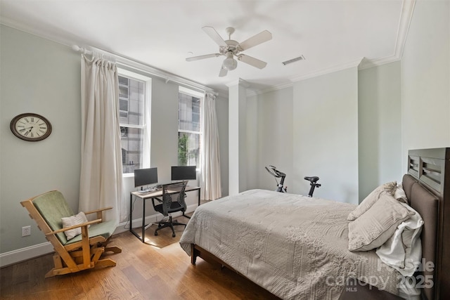 229 N Church St Unit 204, Charlotte, NC 28202 - bedroom featuring crown molding, wood finished floors, ceiling fan, baseboards, and an office area