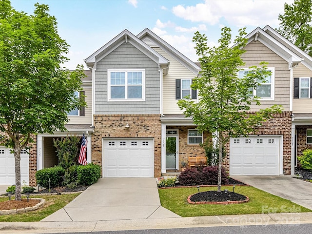 7325 Overmountain Dr, Rock Hill, SC 29732 - view of front facade featuring concrete driveway, brick siding, and an attached garage
